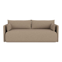 Beige upholstered sofa with minimalist design and soft, textured fabric. Perfect for modern living spaces.