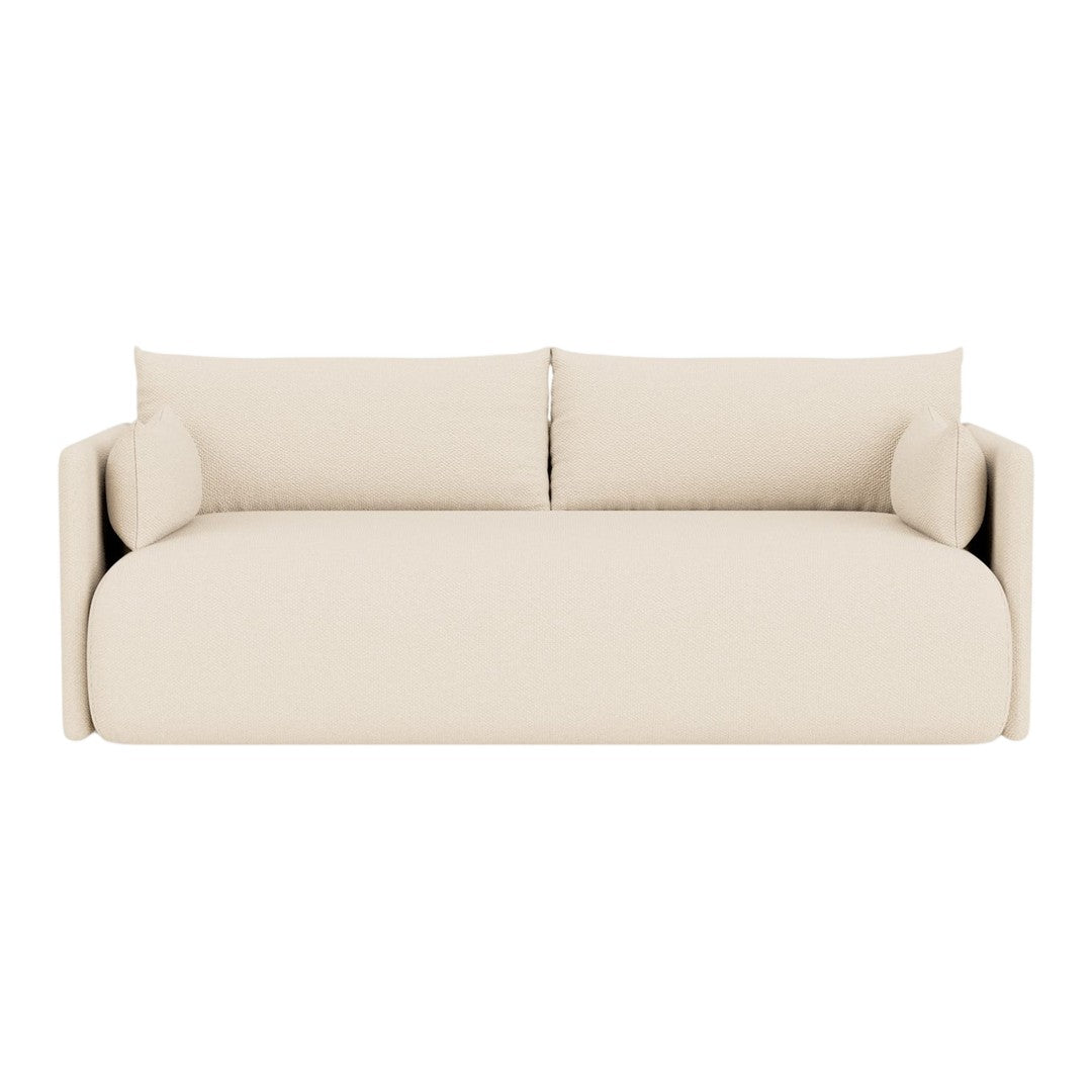 Beige modern sofa with smooth fabric and minimalistic design, featuring no patterns for a clean, contemporary look.