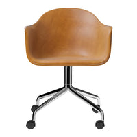 Brown leather chair with a smooth finish and chrome base, featuring a minimalist design and rounded edges.