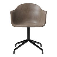 Gray molded chair with smooth finish and black metal base, featuring a minimalist design. Ideal for modern decor.