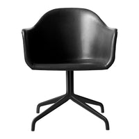 Black modern chair with a sleek, molded design and a sturdy four-point base, perfect for contemporary decor.