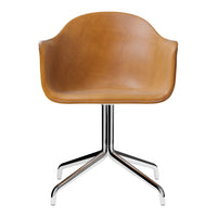 Tan leather chair with a smooth finish, featuring a sleek chrome base and minimalist design. Perfect for modern decor.