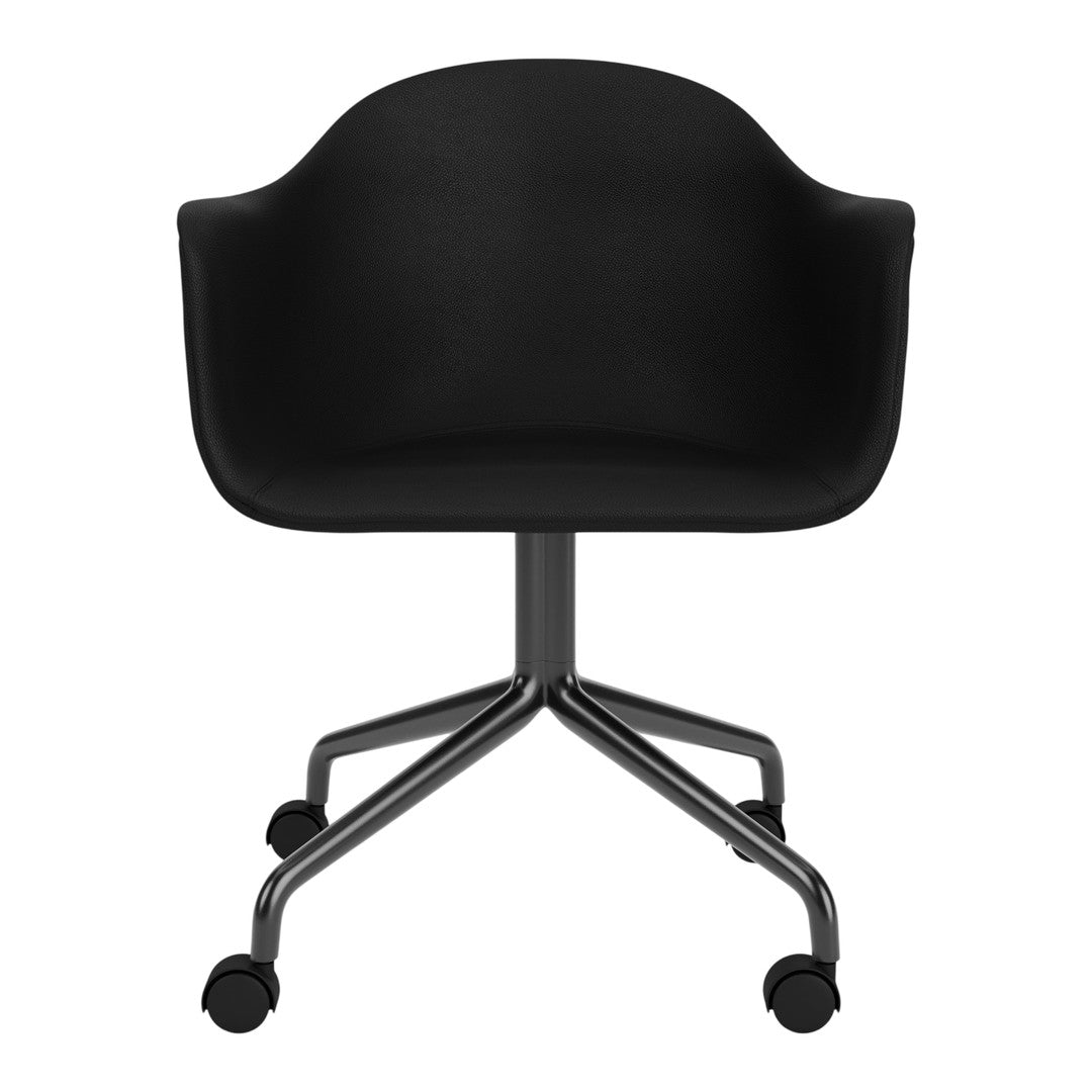 Black upholstered chair with a sleek, modern design and a polished chrome five-star base.