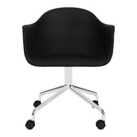 Black upholstered chair with sleek chrome base and rolling casters, perfect for modern office spaces.