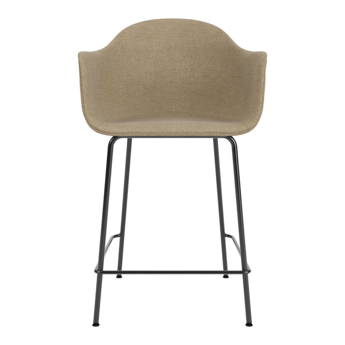 Beige upholstered bar stool with a modern design and sleek black metal legs. Ideal for contemporary decor.