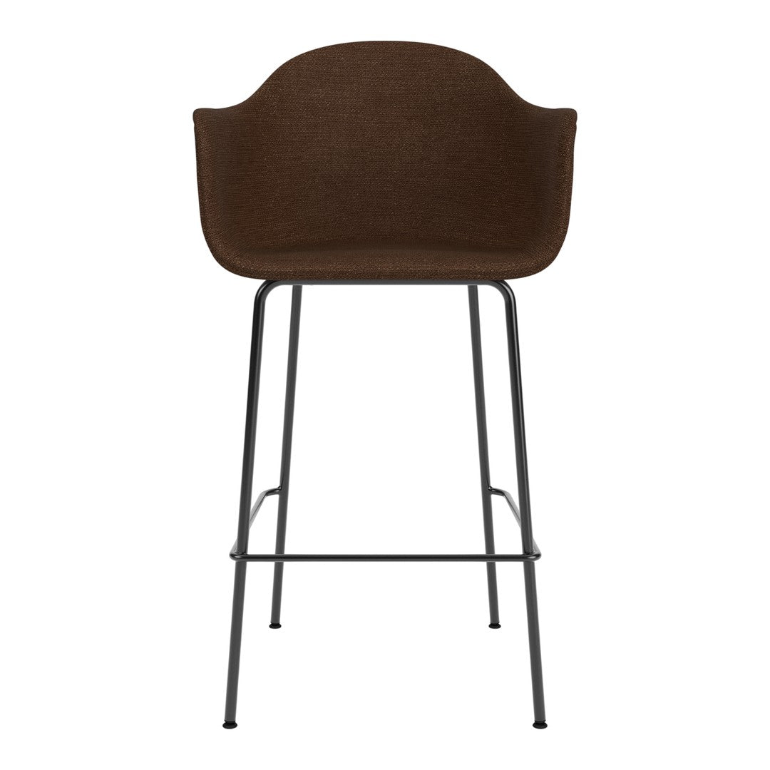 Brown upholstered bar stool with a sleek black metal frame, featuring a minimalist design and smooth curves.