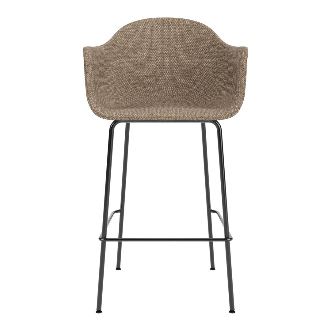 Tan textured bar stool with a sleek black metal frame, perfect for modern decor.