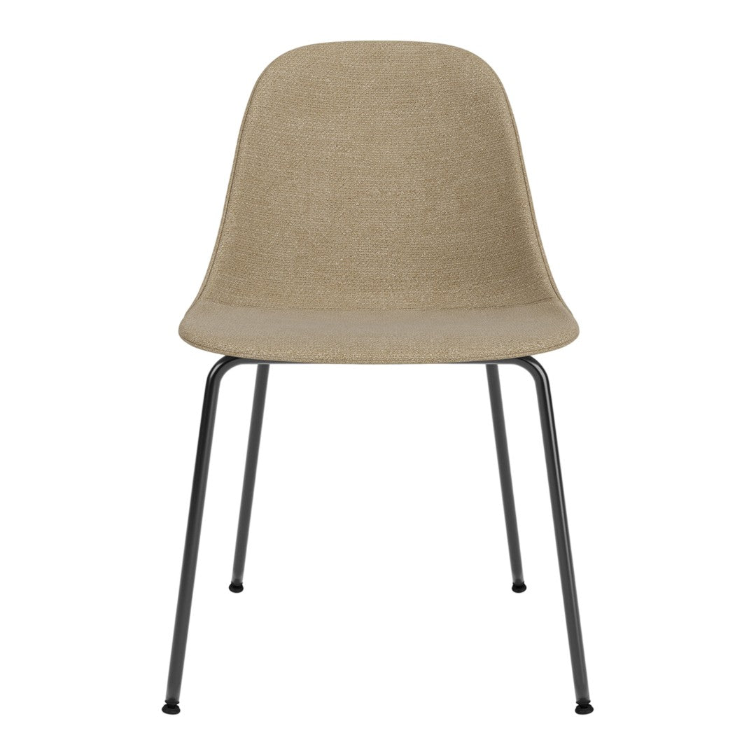 Beige upholstered chair with sleek black metal legs, featuring a minimalist design. Ideal for modern interiors.