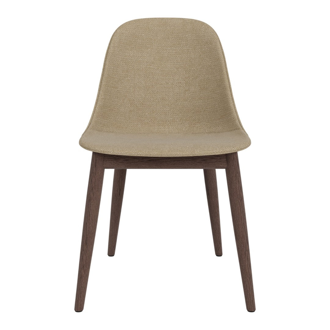 Beige upholstered chair with a sleek, minimalist design and dark wooden legs. Perfect for modern interiors.