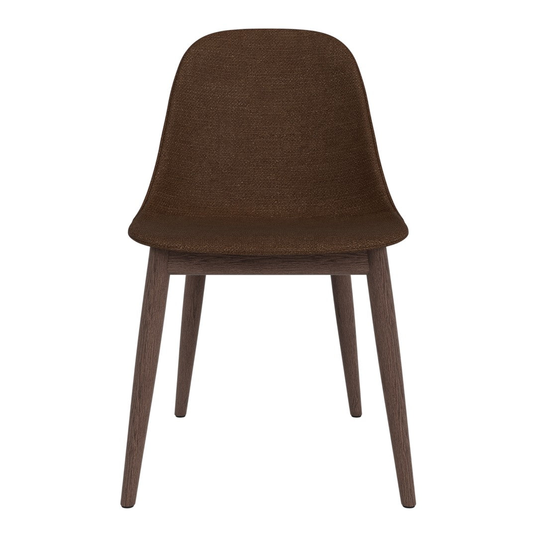 Brown upholstered chair with a smooth, minimalist design and wooden legs, perfect for modern interiors.