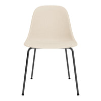 Light beige chair with a smooth, minimalist design and sleek black metal legs. Perfect for modern decor.