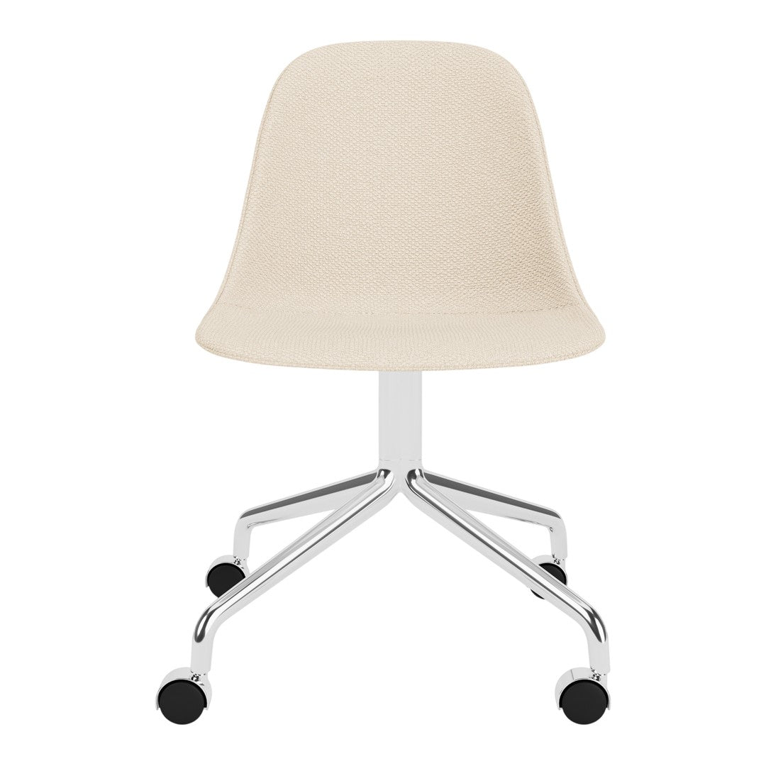 Beige fabric chair with a smooth, curved design and a sleek chrome base, featuring four black rolling casters.