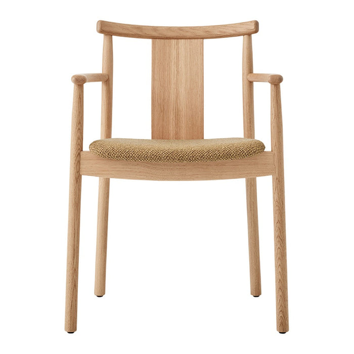 Natural wood chair with a light oak finish and a textured tan woven seat. Simple, modern design with clean lines.