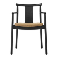 Black wooden chair with a smooth finish and a textured tan seat cushion for a modern aesthetic.