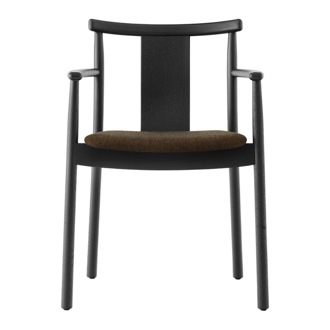 Black wooden chair with a textured brown seat and a sleek, minimalist design. Ideal for modern interiors.