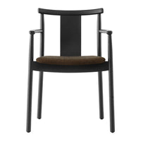 Black wooden chair with a textured brown seat and a sleek, minimalist design. Ideal for modern interiors.