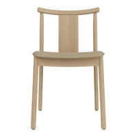 Light natural wood chair with a minimalist design and smooth, polished finish. No intricate patterns, showcasing simplicity.