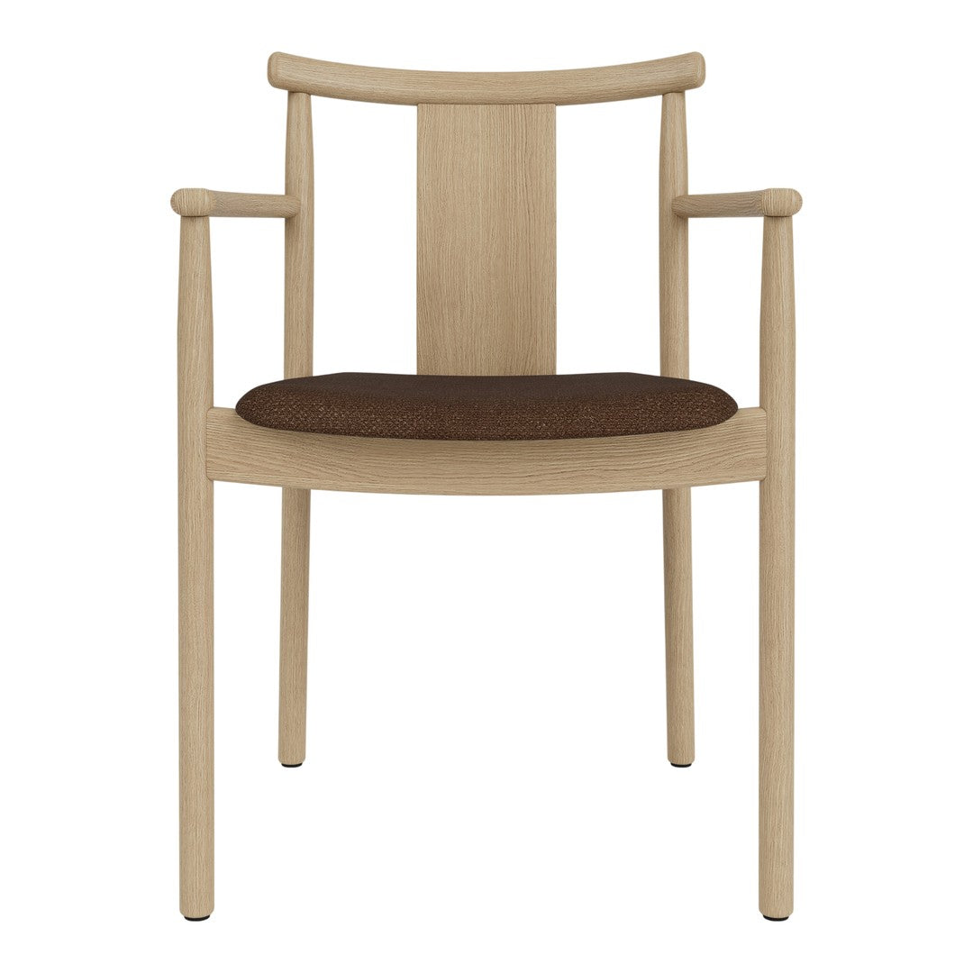 Light wood chair with a brown fabric seat and simple, modern design. Ideal for stylish dining spaces.