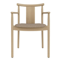 Light wood chair with a beige fabric seat, featuring a simple and modern design with clean lines.