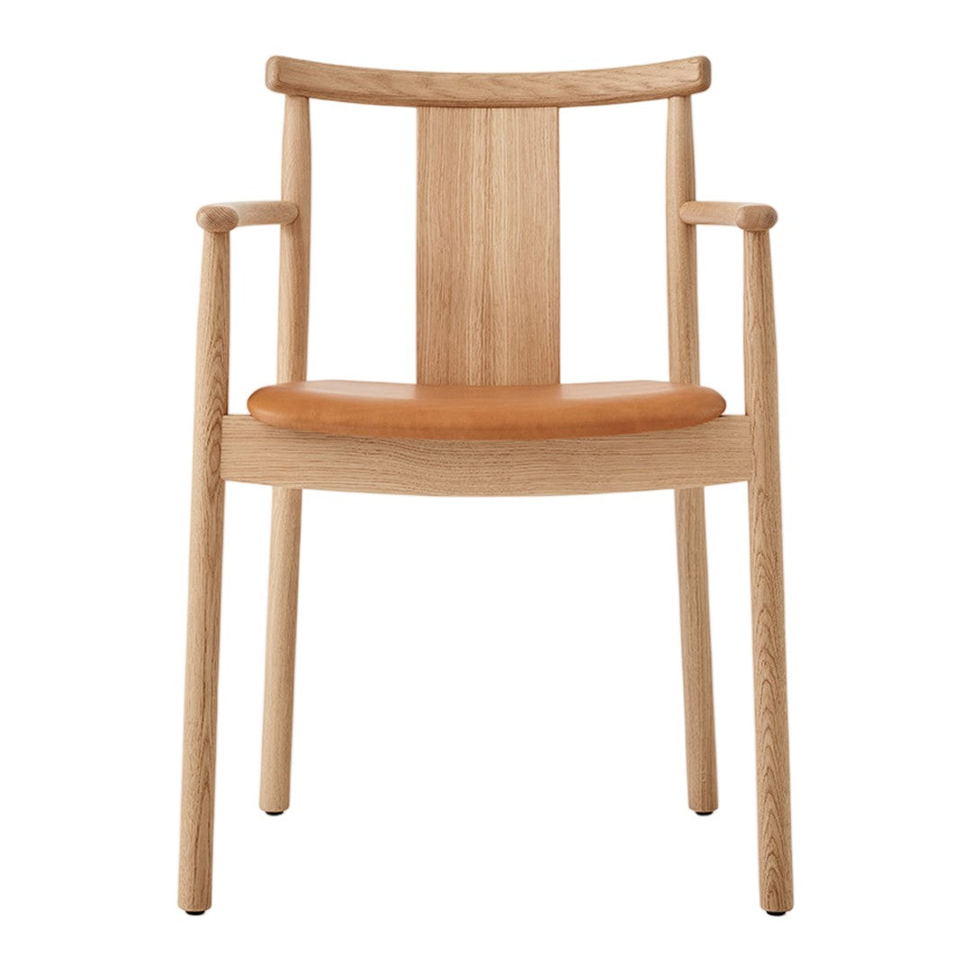 Light oak chair with a smooth wooden finish and a tan leather seat, showcasing an elegant, minimalist design.