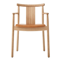 Light oak chair with a smooth wooden finish and a tan leather seat, showcasing an elegant, minimalist design.