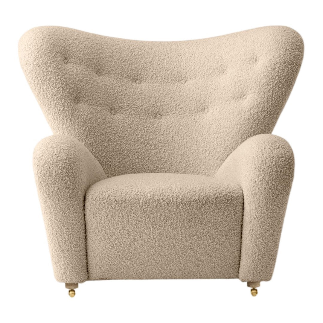 Beige upholstery armchair with a textured, fluffy pattern and tufted backrest, perfect for cozy interiors.