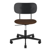 Black modern office chair with a round brown upholstered seat, featuring a minimalist design and five wheels.
