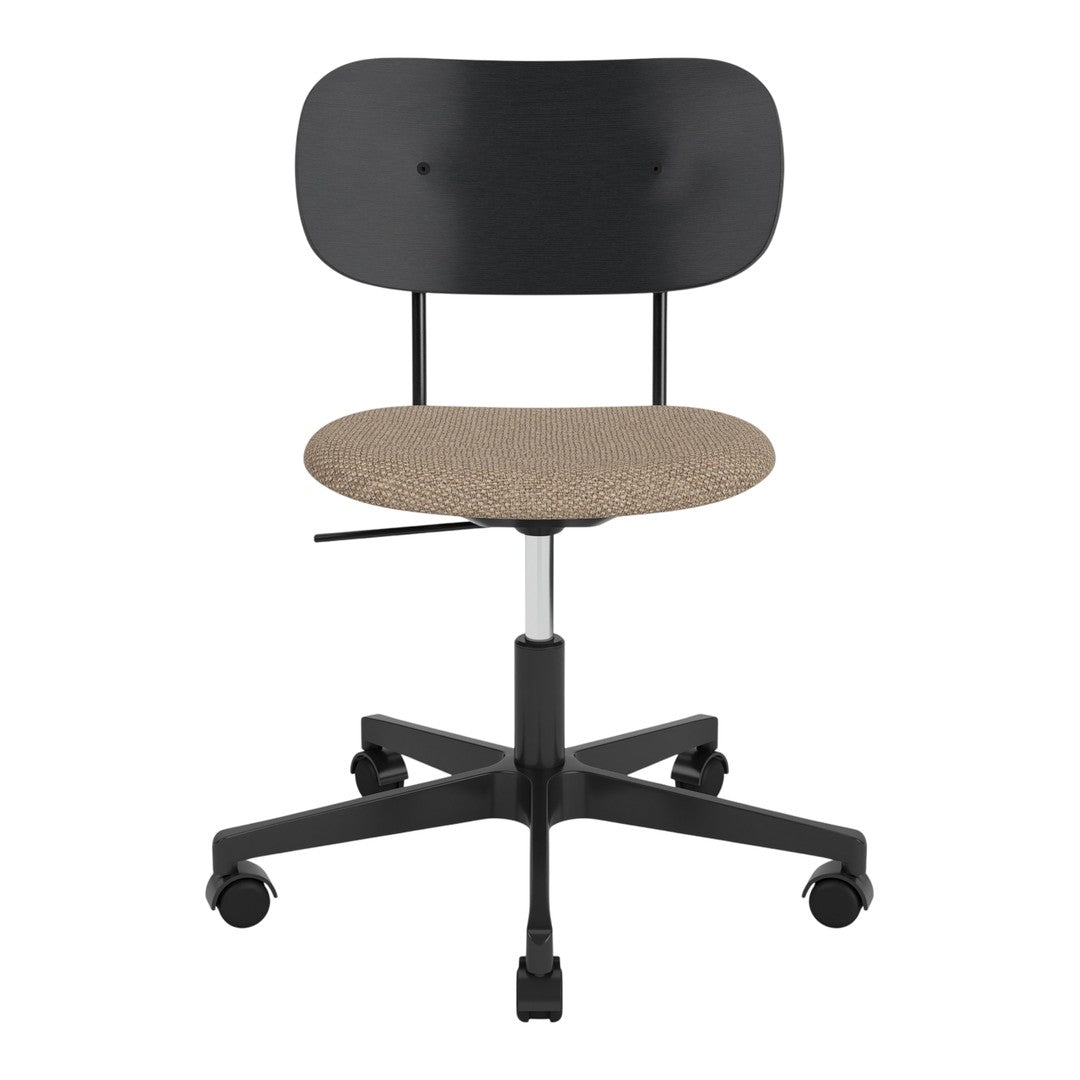 Black ergonomic chair with a textured tan seat, featuring a simple, modern design. Ideal for office or home use.