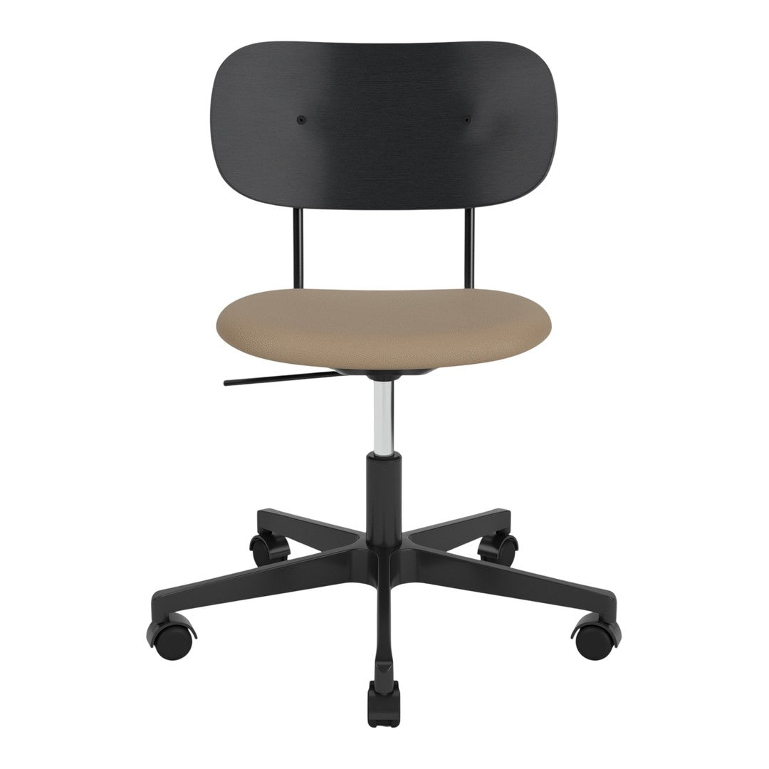 Black ergonomic chair with a round backrest and a beige cushioned seat, featuring a sleek, minimalist design.