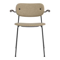 Beige upholstered chair with black metal legs and accents, featuring a smooth, minimalistic design.