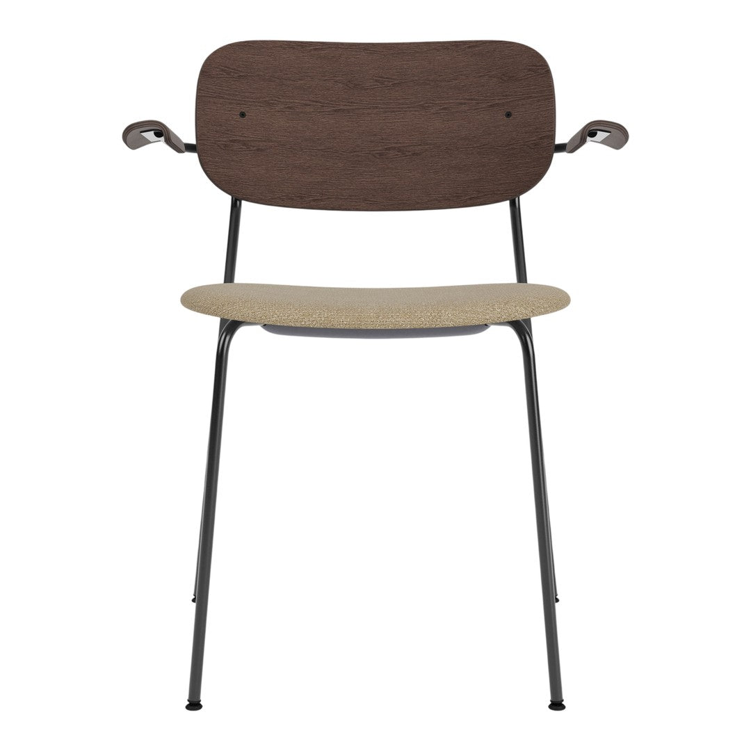 Brown wood backrest, beige seat, and sleek black metal legs create a modern and minimalist chair design.