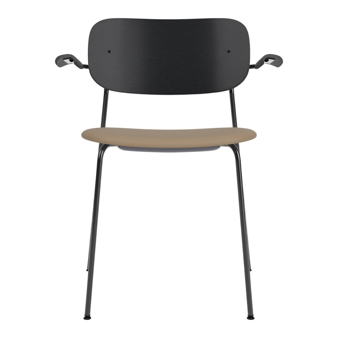 Black and tan chair with a sleek design, featuring a minimalist pattern and metal legs.