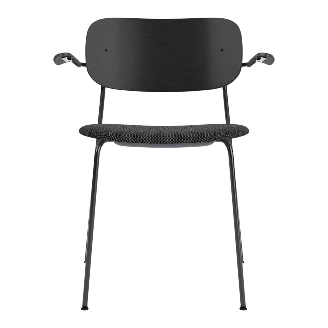 Black chair featuring a smooth backrest and textured seat, with sleek metal legs for a modern look.
