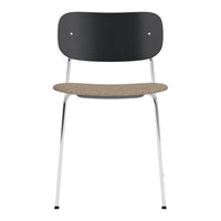 Black chair with a cork seat and chrome legs, featuring a sleek, minimalist design. Perfect for modern interiors.