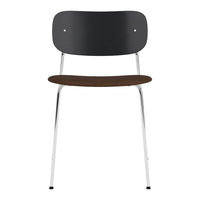 Black chair with a smooth backrest, brown wooden seat, and shiny chrome legs. Modern and minimalist design.