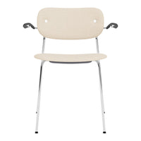 Beige upholstered chair with chrome legs and minimalist design, featuring a simple and clean aesthetic.