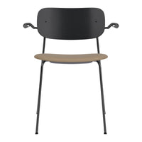 Black and beige chair with minimalistic design and smooth, curved lines. Perfect blend of modern aesthetics.