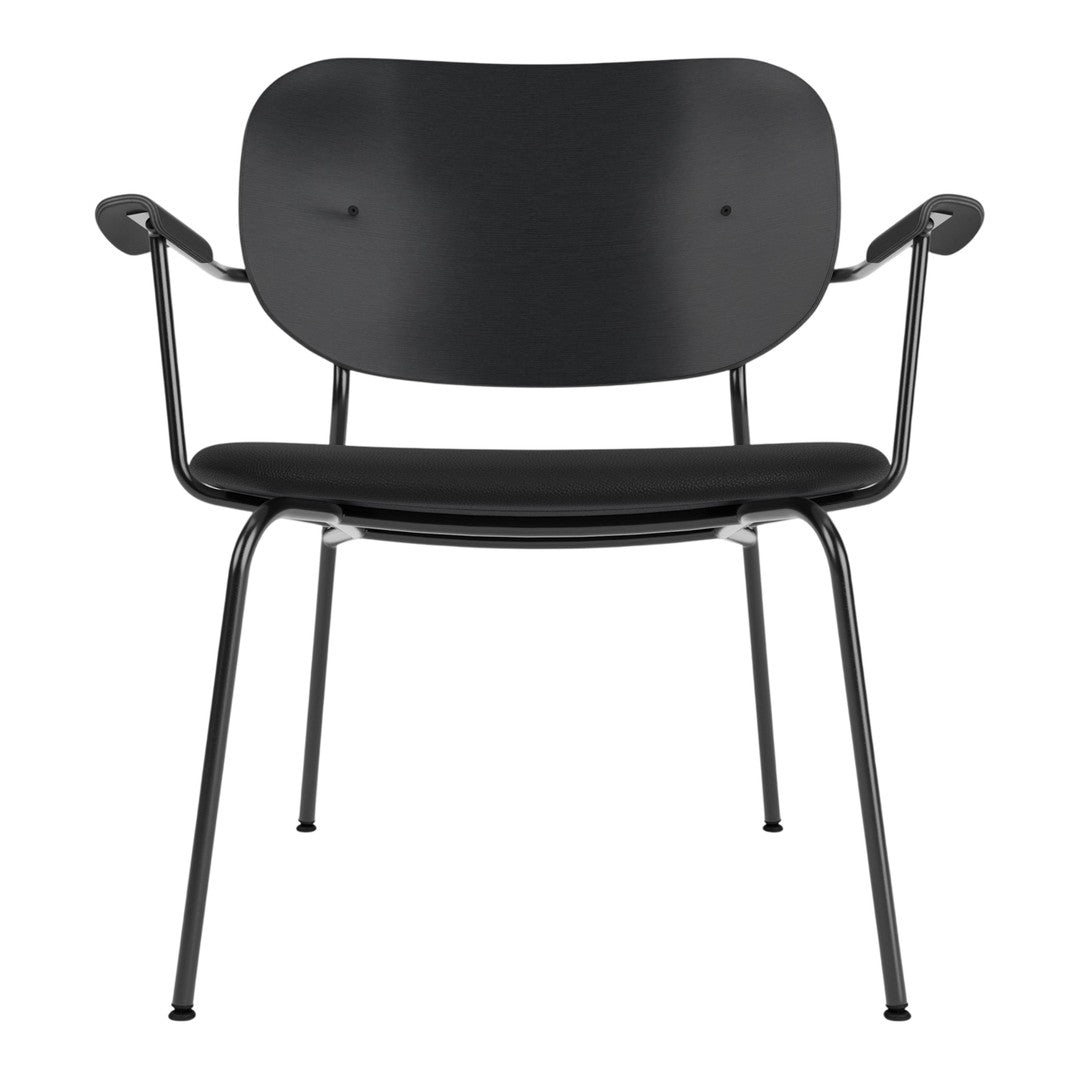 Black modern chair with minimalist design, featuring a smooth seat and rounded backrest on sleek metal legs.