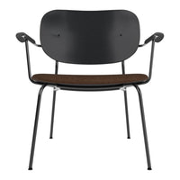Black metal chair with a smooth, curved backrest and a rich brown cushioned seat. Elegant and modern design.