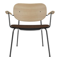 "Wooden chair with a natural finish and dark brown fabric seat, featuring sleek black metal legs."