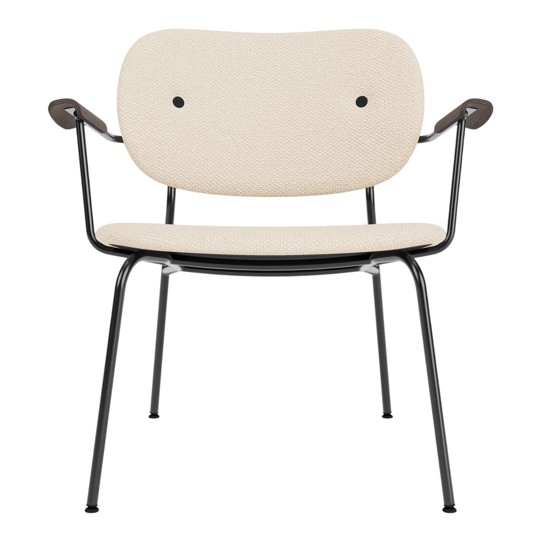 Beige fabric chair with a minimalist design and sleek black metal frame, featuring curved armrests.