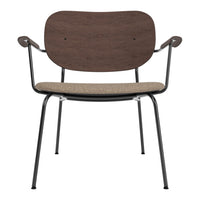 Brown wooden backrest with a beige patterned seat on a black metal frame chair. Ideal for modern decor.