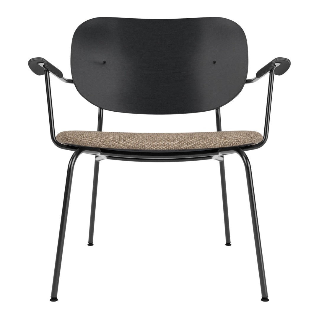 Black metal chair with a beige textured fabric seat, featuring a minimalist design and smooth curves.