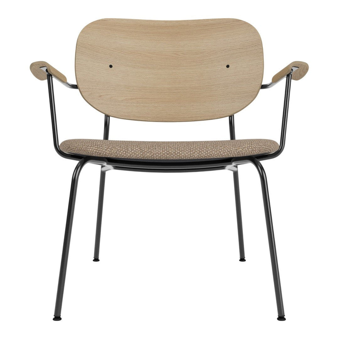 Natural wood finish with a matte beige seat; minimalist design featuring black metal legs and armrests.
