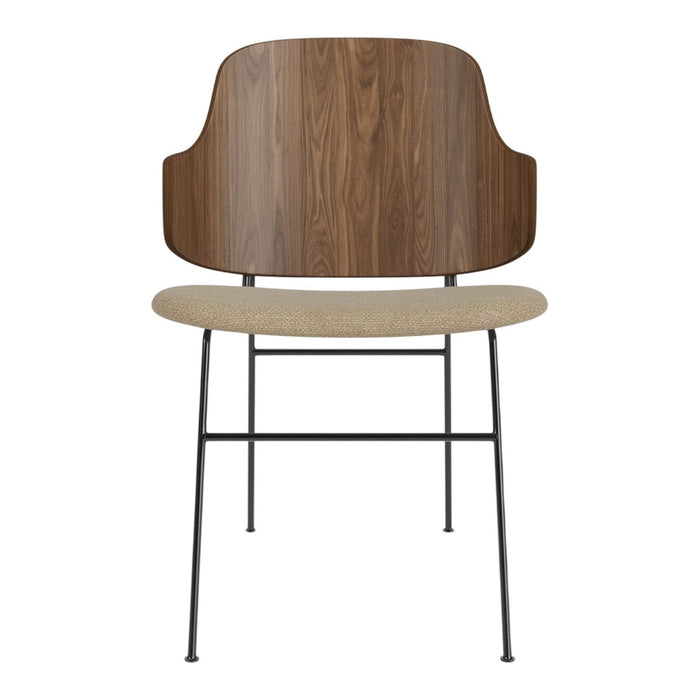 Modern chair with a walnut wood back, beige seat cushion, and sleek black metal legs, showcasing a minimalist design.