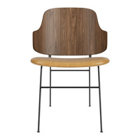 Mid-century modern chair with a walnut wood backrest, light wood seat, and sleek black metal legs.