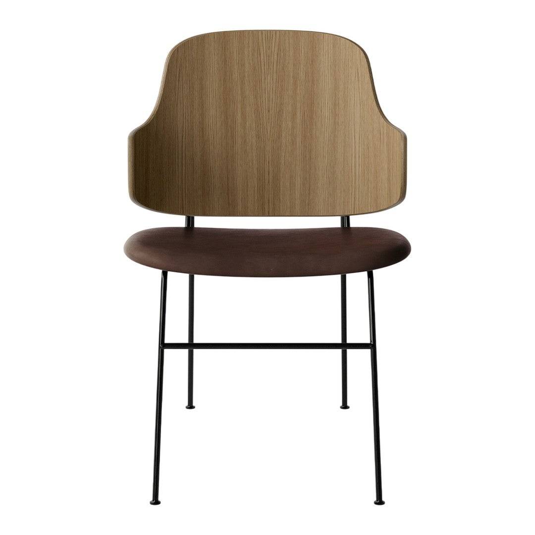 Wooden chair with a light oak backrest, brown upholstered seat, and black metal legs. Modern minimalist design.