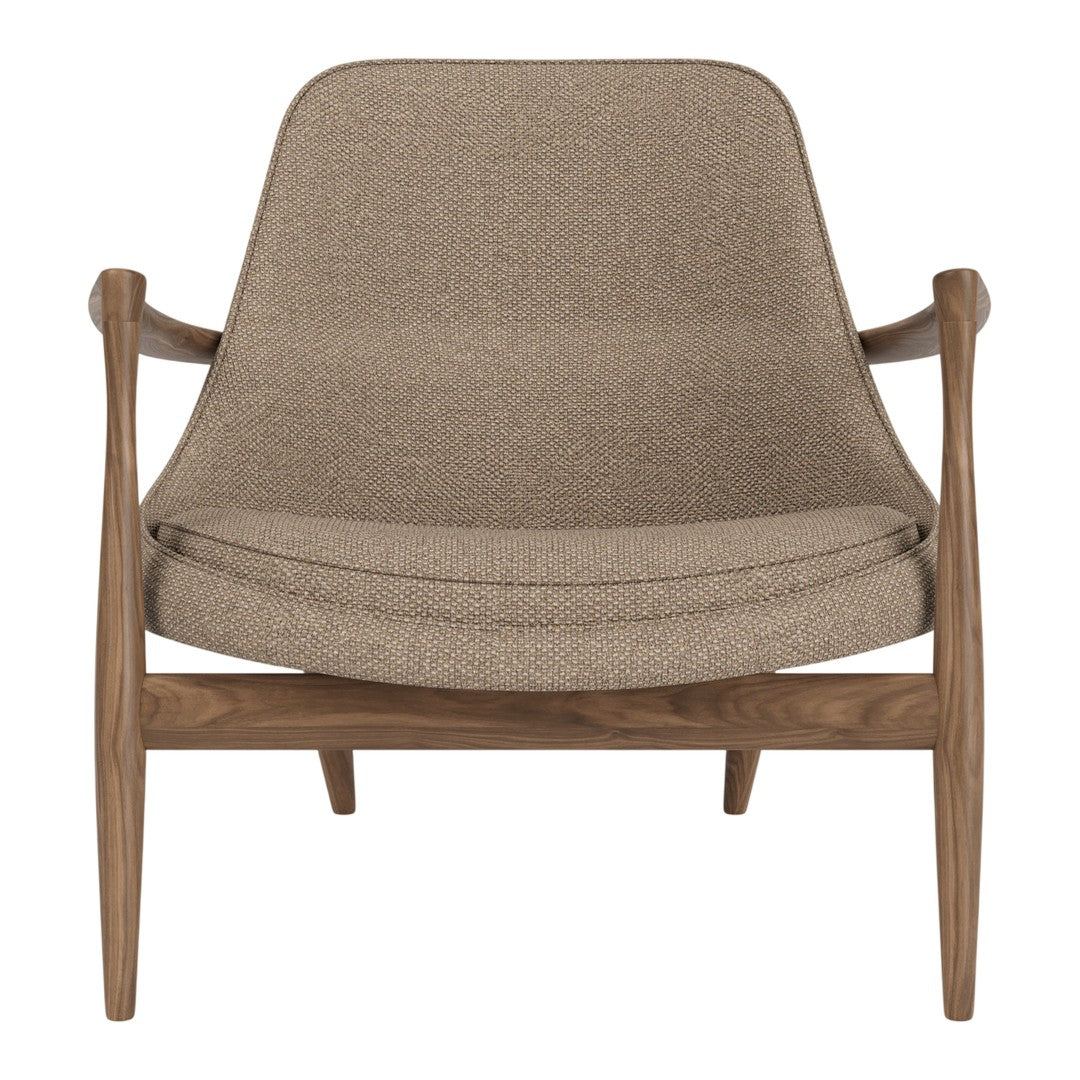 Brown textured fabric armchair with sleek wooden legs, perfect for modern interiors.