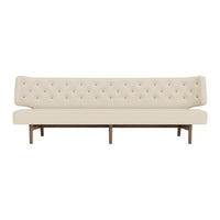 Beige tufted sofa with a smooth, minimalistic design and wooden legs for a modern touch.