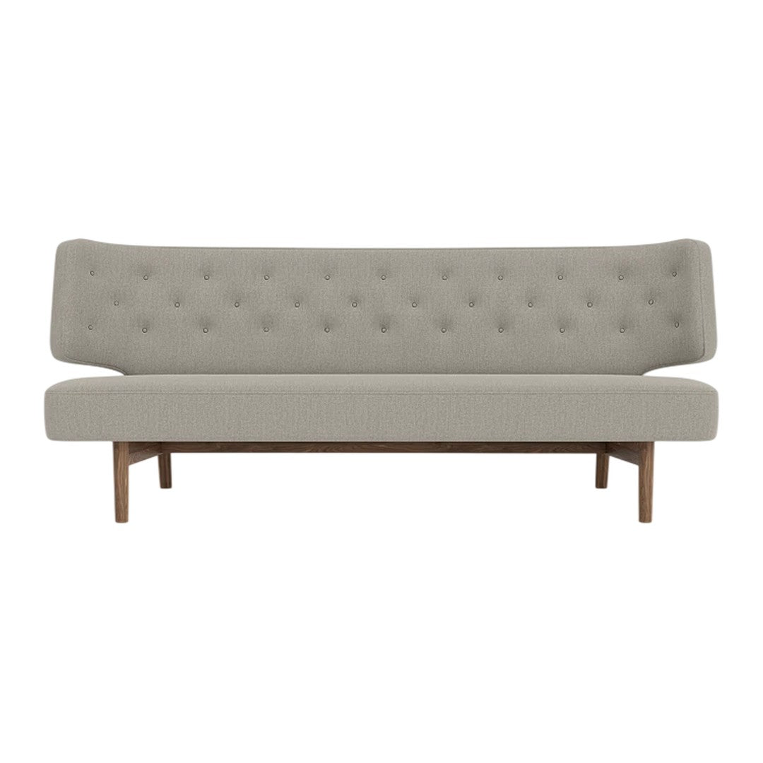 Light gray tufted sofa with a sleek wooden frame, featuring a minimalist design and smooth upholstery.